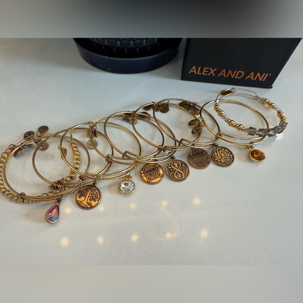 9 vintage EUC Alex and Ani Gold Charm Bracelet Set with box